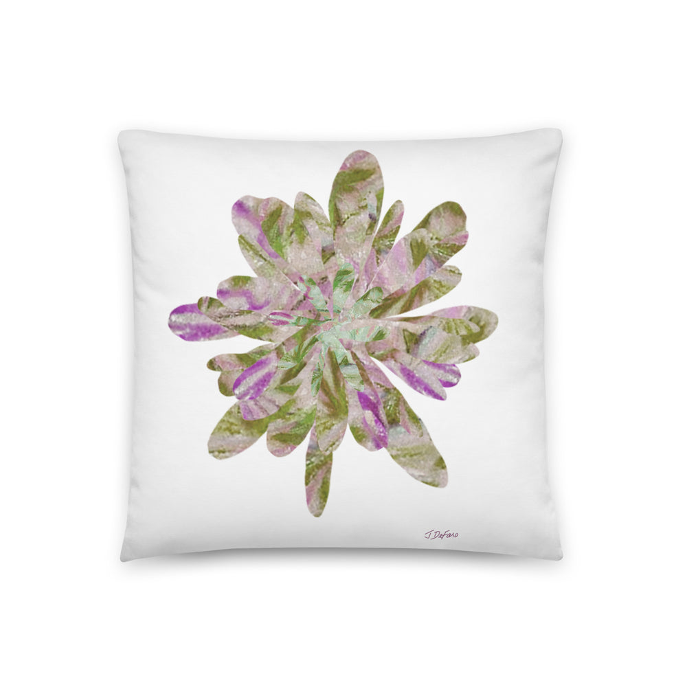 white pillow with pink and greens floral 