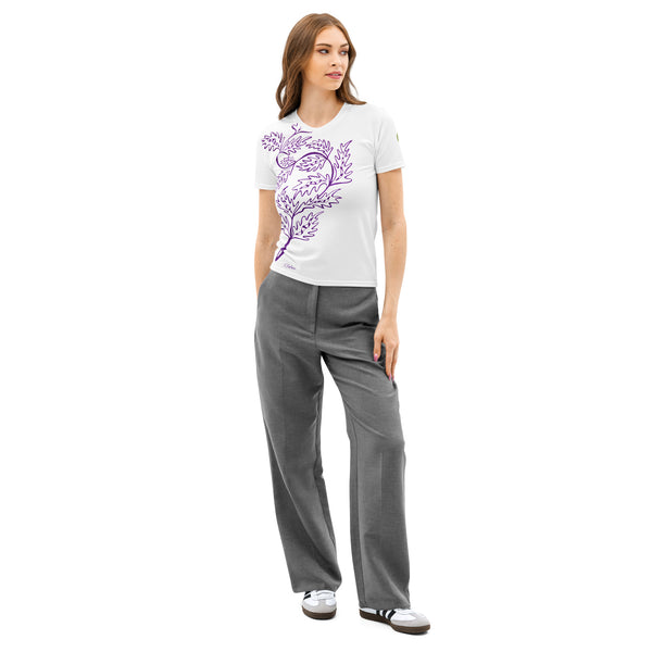 Woman wearing a white t-shirt with a purple leaf design and gray pants on a white background