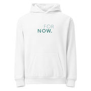 The words FOR NOW printed on a white hoodie