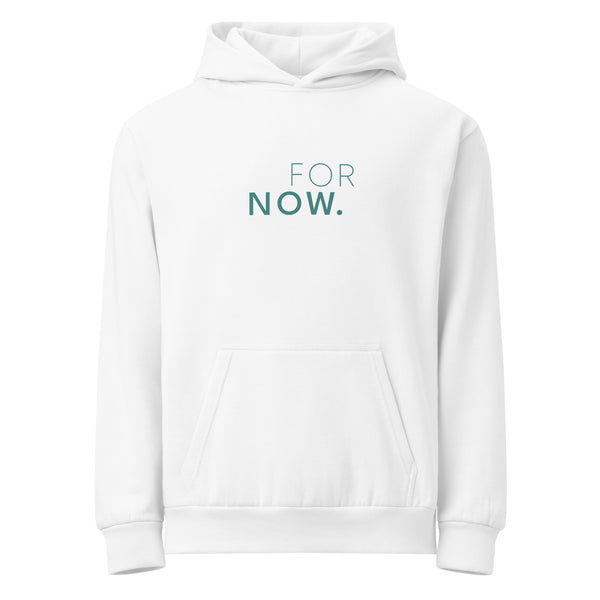 The words FOR NOW printed on a white hoodie