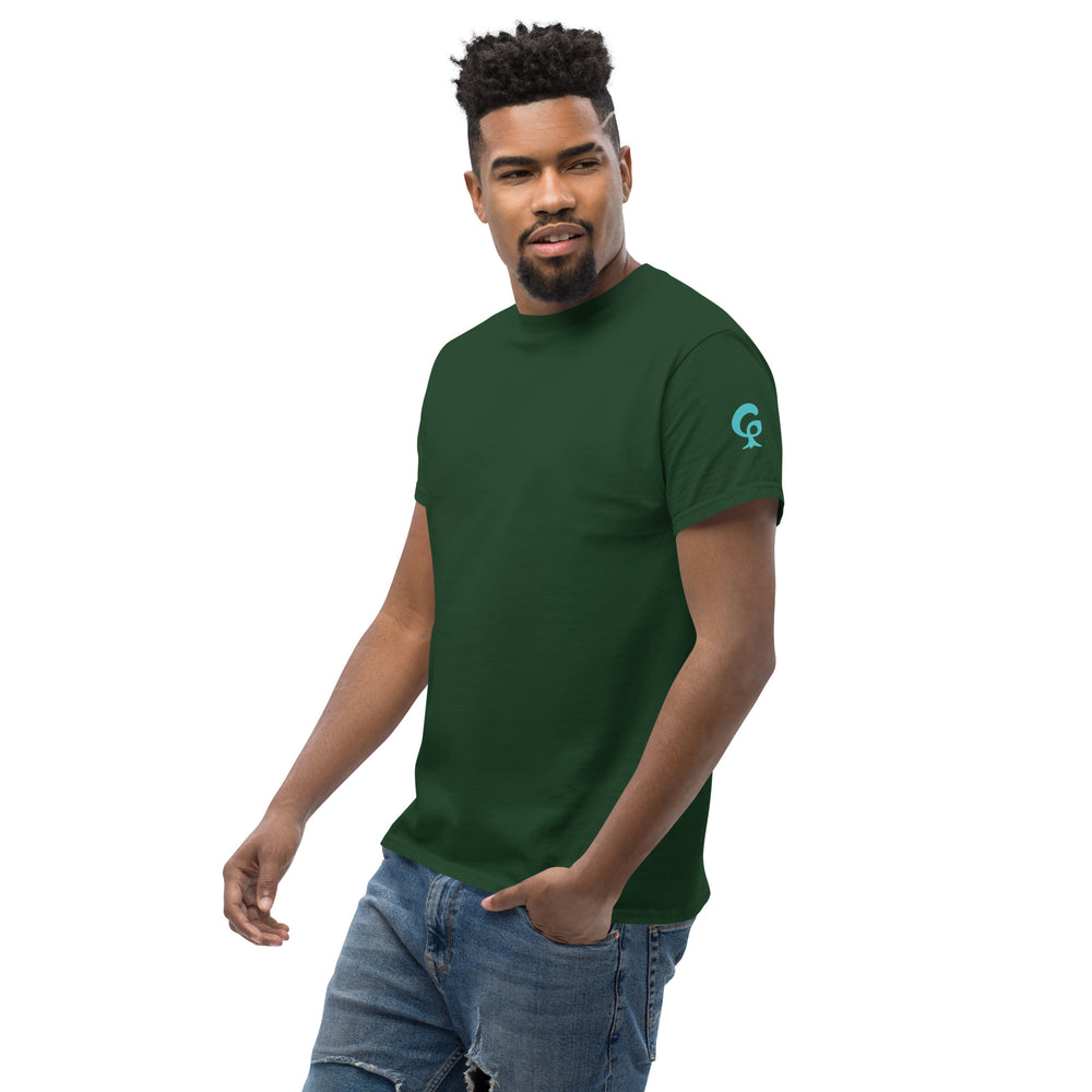 Man wearing a green t-shirt with a logo on the left sleeve on a white background