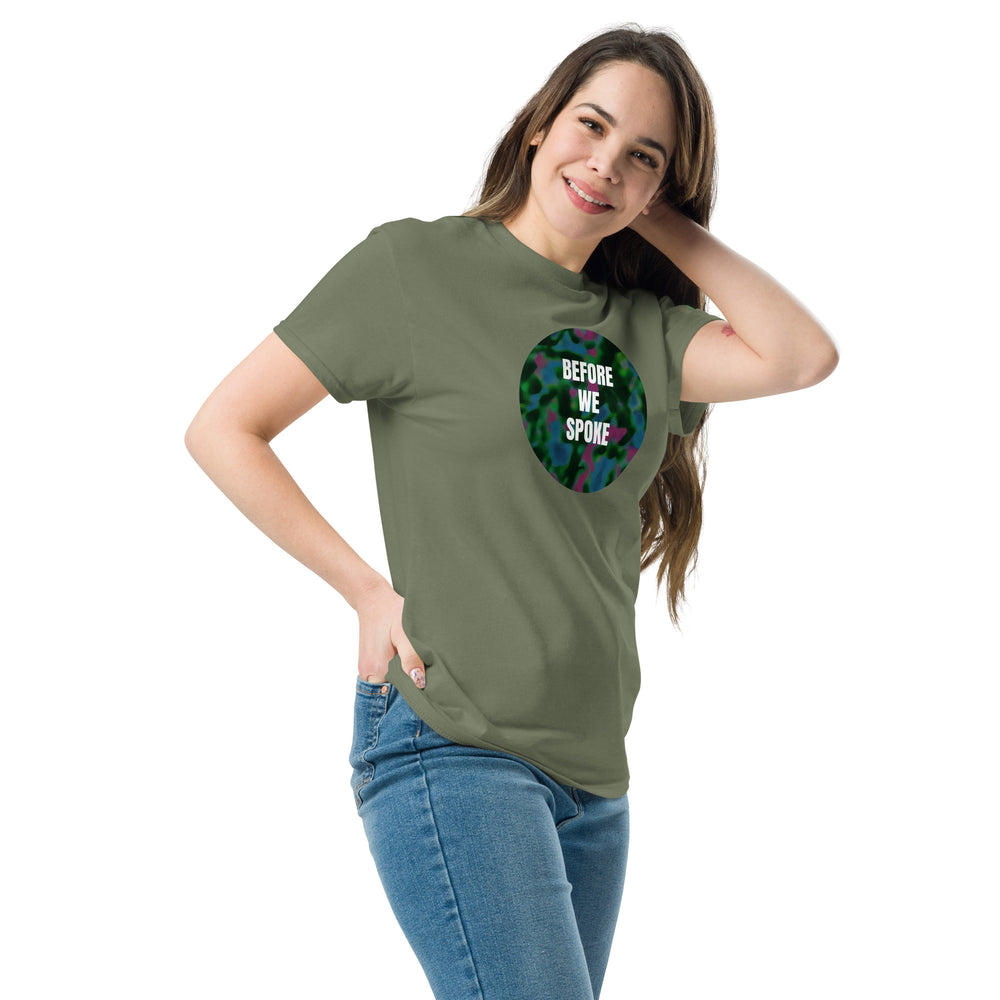 Woman wearing a green t-shirt with a colorful design and text on a green background
