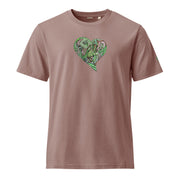 Blush colored t-shirt with a green graphic heart design on a blush colored background