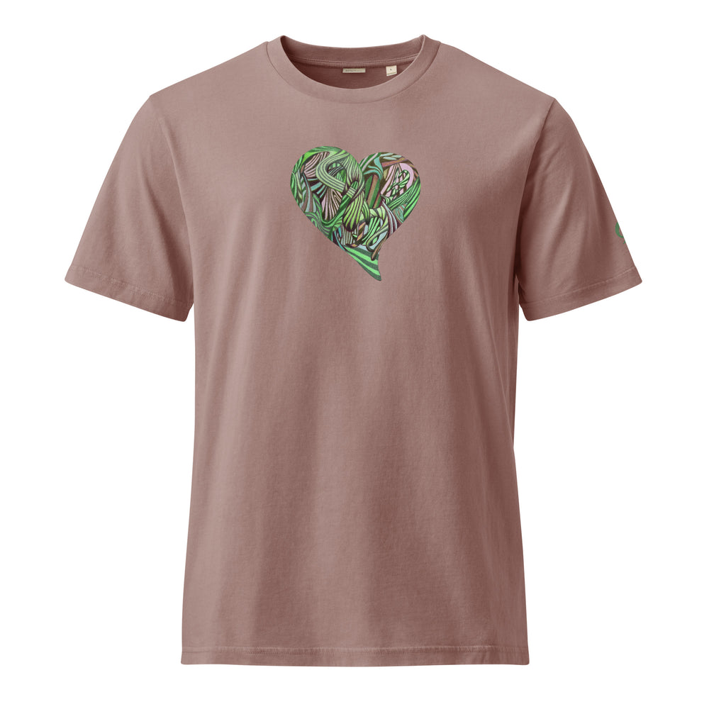 Blush colored t-shirt with a green graphic heart design on a blush colored background