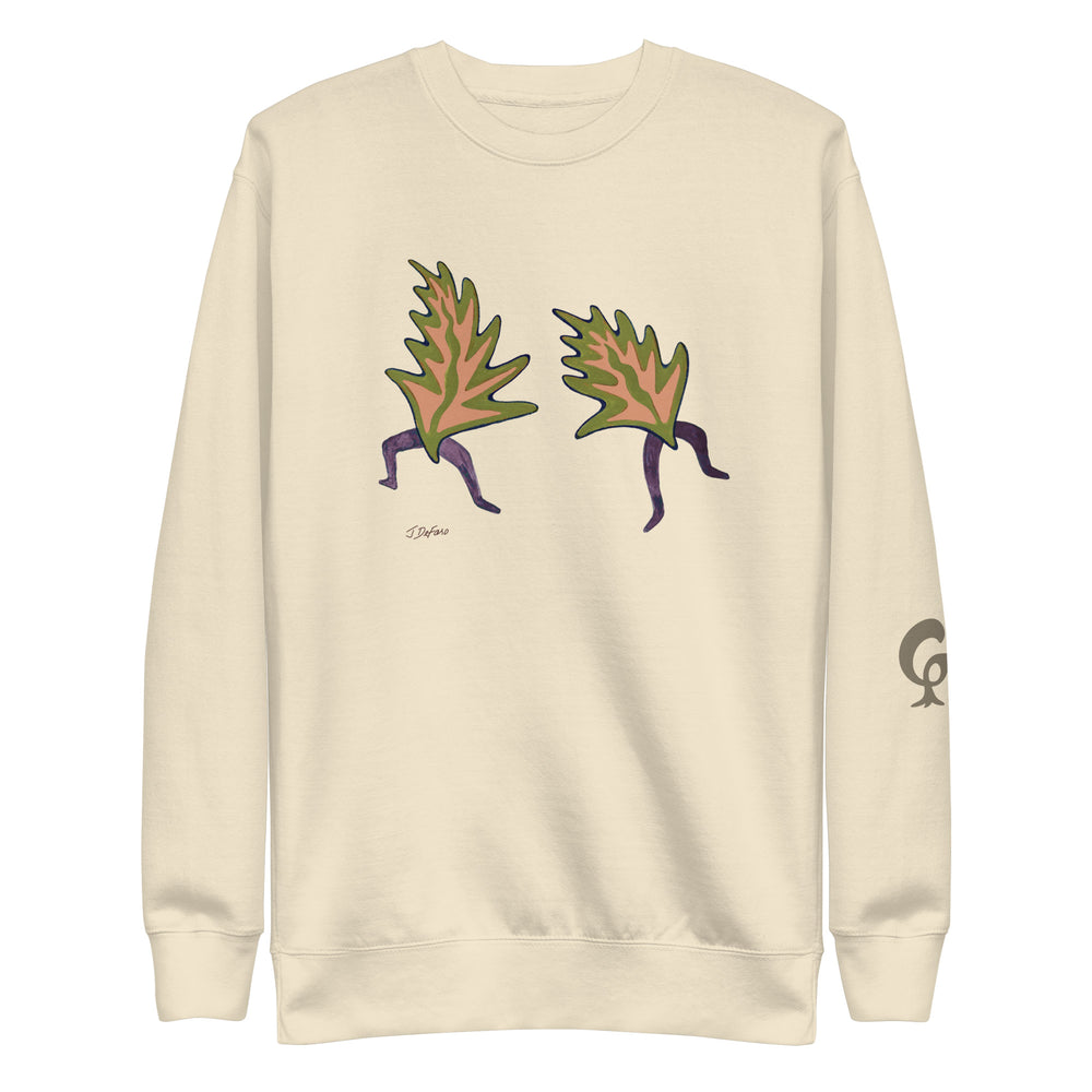 cream sweatshirt with dancing leaves on cream background