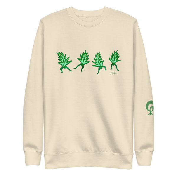 Cream sweatshirt with graphic dancing leaves on cream background