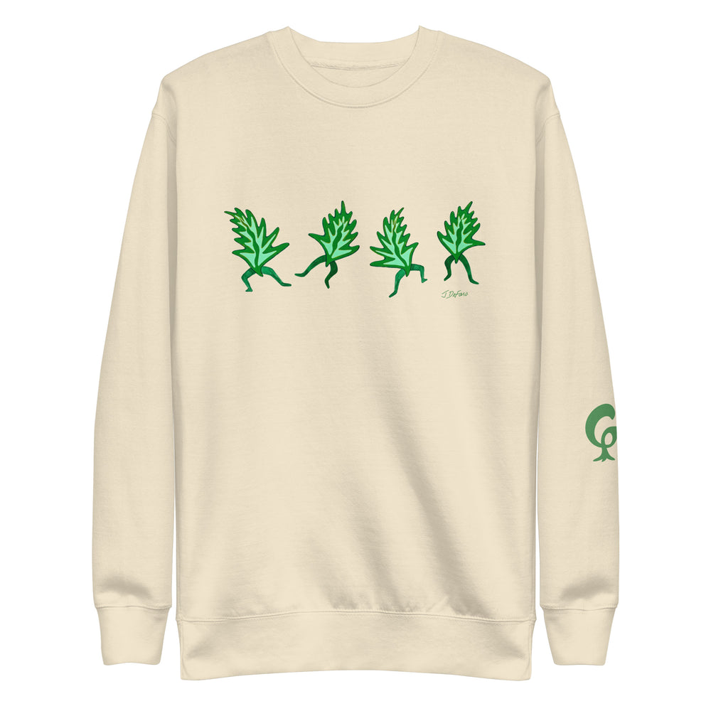 Cream sweatshirt with graphic dancing leaves on cream background