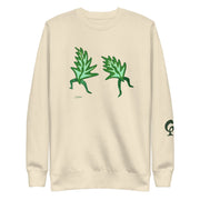 cream sweatshirt with dancing leaves on a cream background