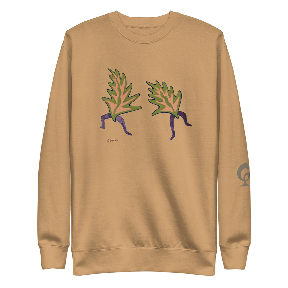 dark beige sweatshirt with dancing leaves on dark beige background