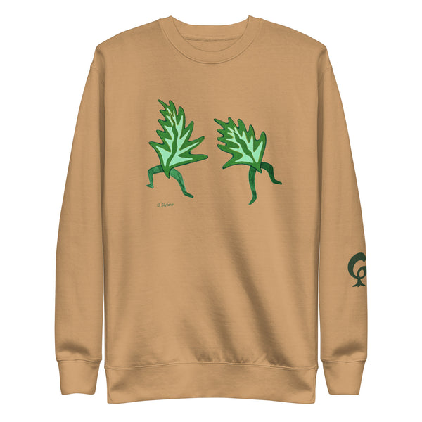 beige sweatshirt with dancing leaves on a beige background
