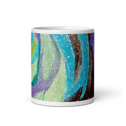 White glossy mug with colorful abstract  design on white background 