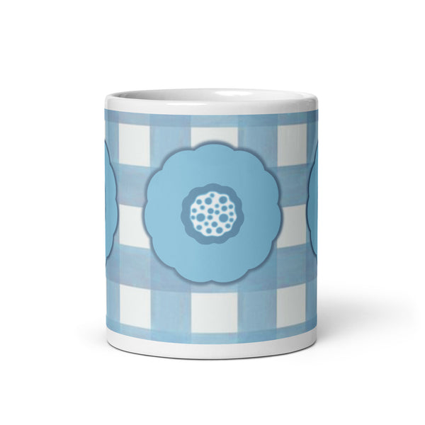 Blue graphic flower printed on a white glossy ceramic mug