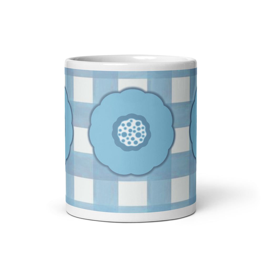 Blue graphic flower printed on a white glossy ceramic mug