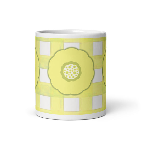 Mug with a yellow floral design on a white background
