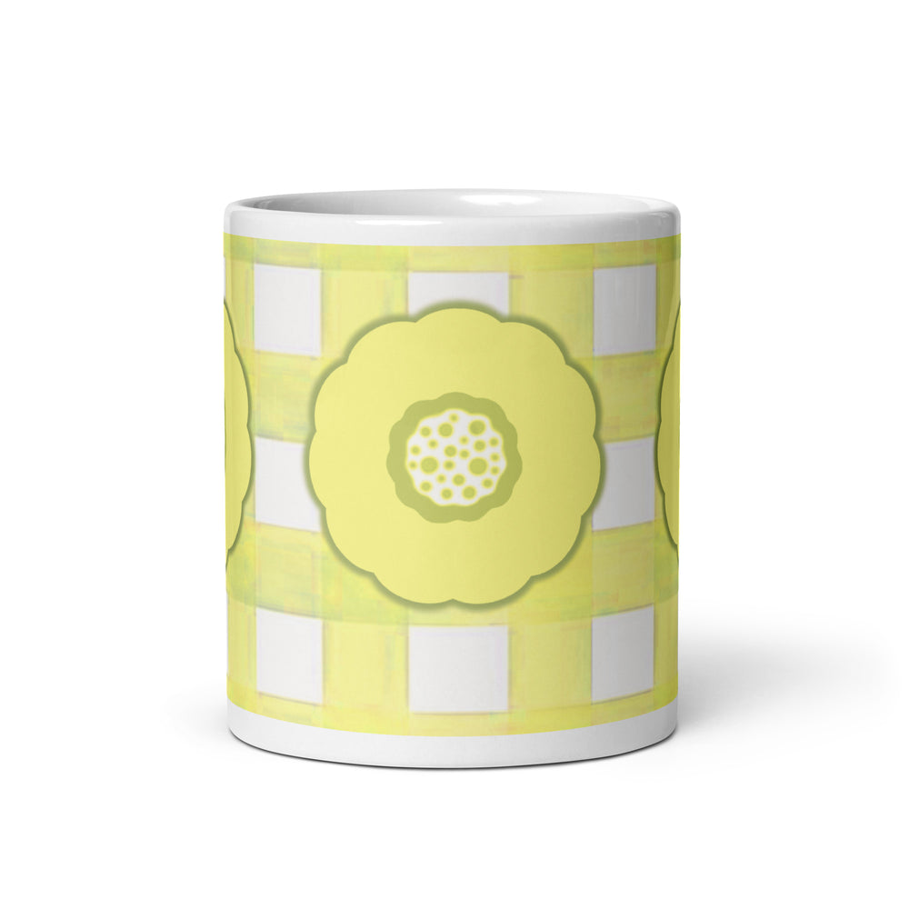 Mug with a yellow floral design on a white background