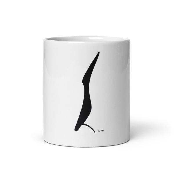 Tall black bird looking up printed on a white glossy ceramic mug