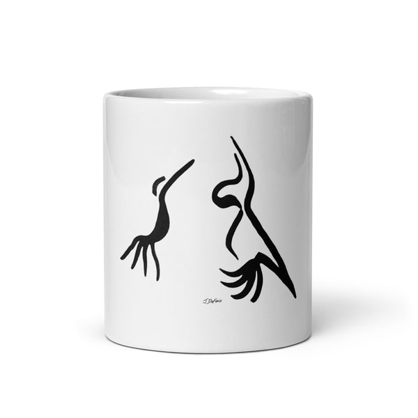 Two graphic birds talking printed on a white glossy ceramic mug