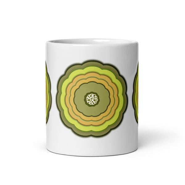 White glossy mug with 3 yellow and green graphic blooms on a white background